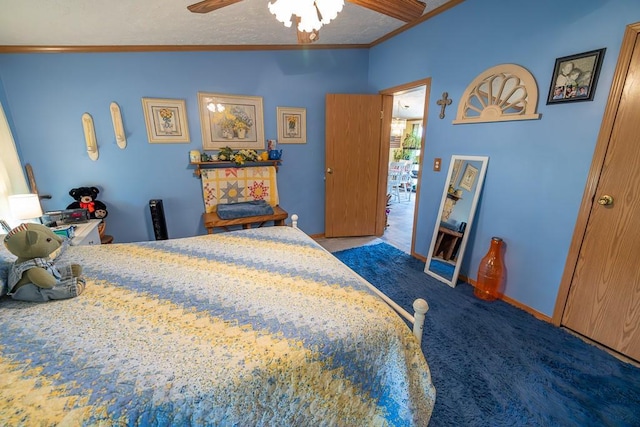 carpeted bedroom featuring lofted ceiling, crown molding, a ceiling fan, and baseboards