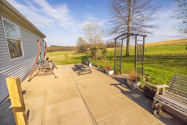 view of patio with a rural view