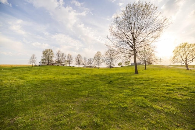 view of yard with a rural view