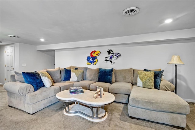 living area featuring carpet floors, recessed lighting, and visible vents