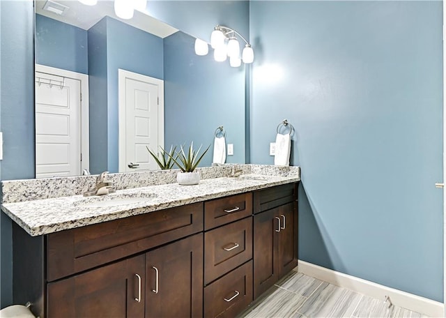 15841 Shawnee Dr, Overland Park, KS 66223 - full bath featuring baseboards and double vanity