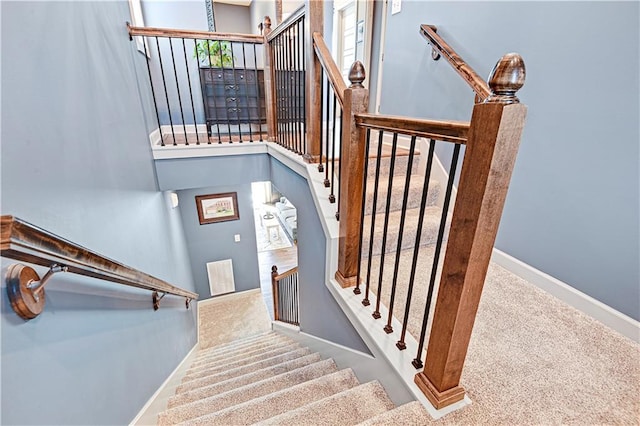 15841 Shawnee Dr, Overland Park, KS 66223 - stairway featuring baseboards and carpet