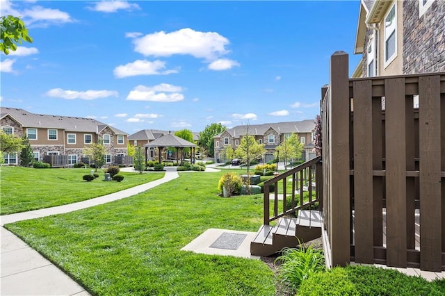 15841 Shawnee Dr, Overland Park, KS 66223 - view of community with a residential view, a gazebo, a lawn, and stairway