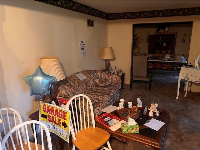 living room featuring visible vents