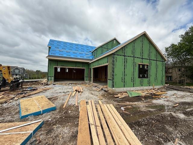 exterior space with a garage