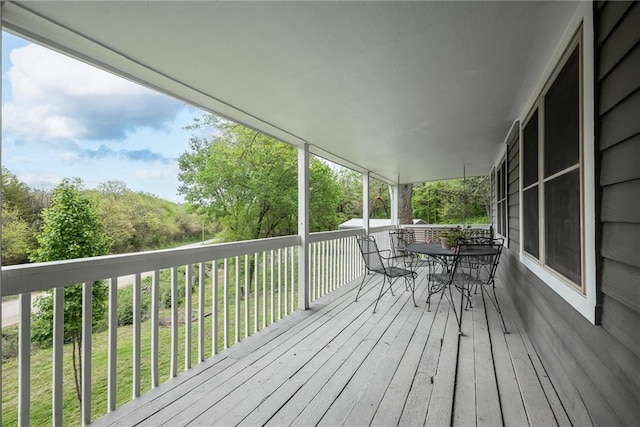 deck featuring outdoor dining space