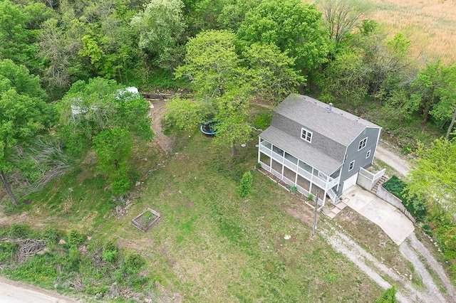 drone / aerial view with a view of trees