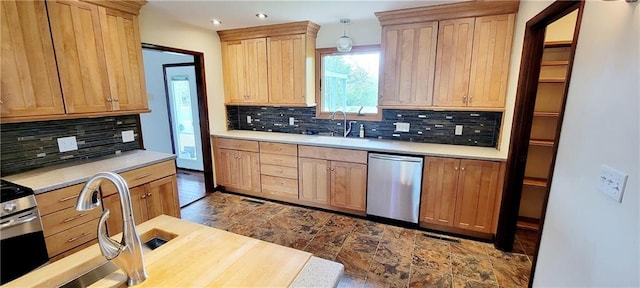 1620 Neosho St, Humboldt, KS 66748 - kitchen featuring tasteful backsplash, a sink, light countertops, dishwasher, and recessed lighting