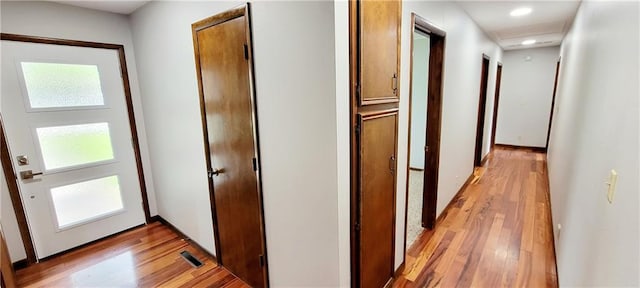 1620 Neosho St, Humboldt, KS 66748 - hall with recessed lighting and light wood-style flooring
