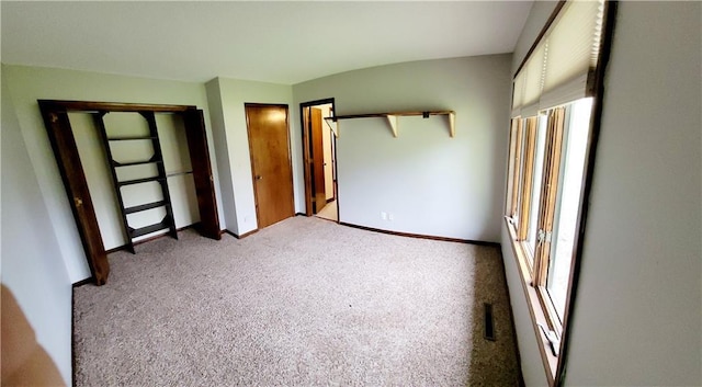 1620 Neosho St, Humboldt, KS 66748 - unfurnished bedroom with carpet floors and baseboards