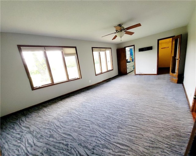 1620 Neosho St, Humboldt, KS 66748 - unfurnished room featuring ceiling fan, carpet floors, and baseboards