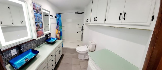 1620 Neosho St, Humboldt, KS 66748 - full bath with tile patterned floors, a shower stall, toilet, and vanity
