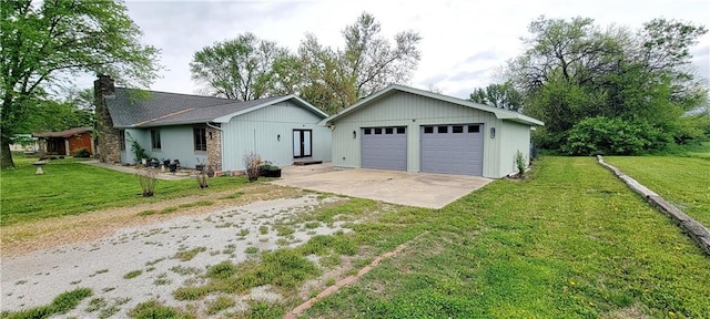 1620 Neosho St, Humboldt, KS 66748 - single story home with a front yard, a garage, and a chimney