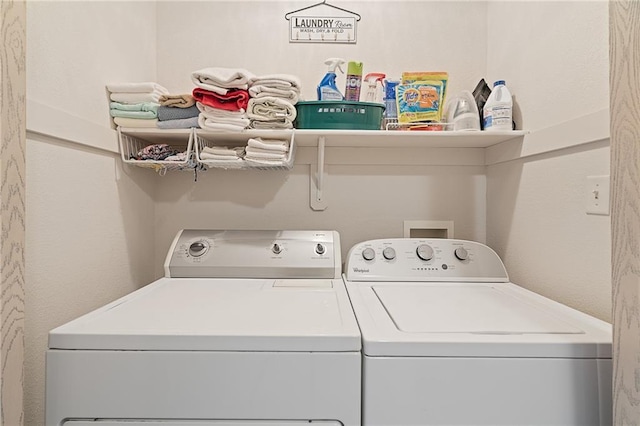 laundry area with laundry area and independent washer and dryer