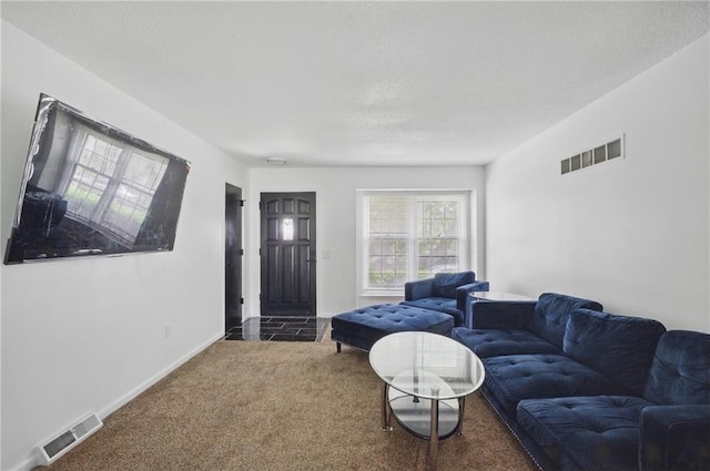 5900 Westridge Rd, Kansas City, MO 64133 - carpeted living area with healthy amount of natural light and baseboards
