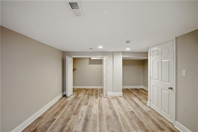 2640 S 53rd St, Kansas City, KS 66106 - finished basement with visible vents, light wood-type flooring, recessed lighting, and baseboards