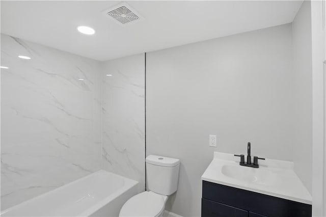 2640 S 53rd St, Kansas City, KS 66106 - bathroom with toilet, recessed lighting, visible vents, and vanity
