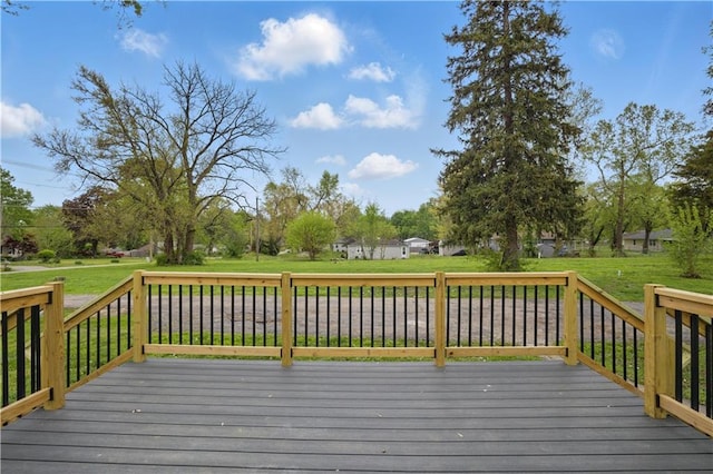 2640 S 53rd St, Kansas City, KS 66106 - wooden deck with a lawn
