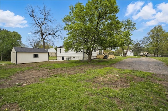 2640 S 53rd St, Kansas City, KS 66106 - view of yard featuring an outbuilding