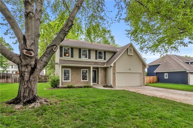 traditional home with fence, driveway, and a front yard