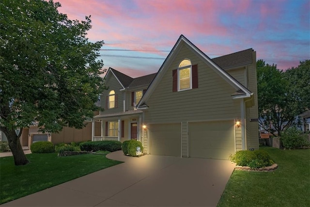 12606 Slater St, Overland Park, KS 66213 - traditional-style home with an attached garage, a yard, and concrete driveway