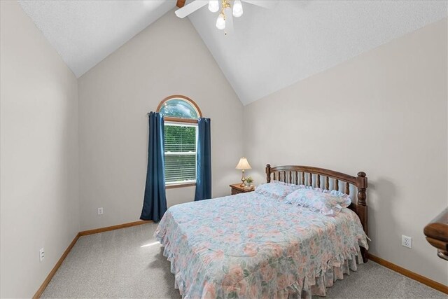 12606 Slater St, Overland Park, KS 66213 - bedroom featuring carpet flooring, lofted ceiling, and a ceiling fan