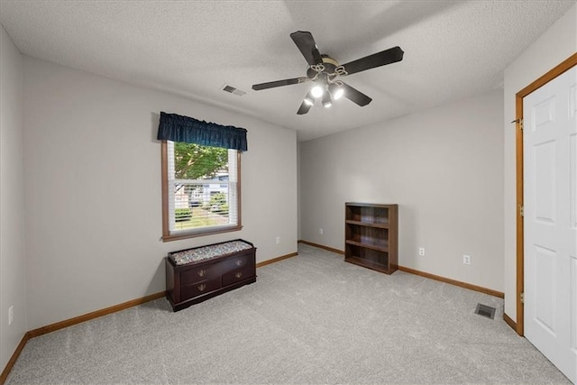 12606 Slater St, Overland Park, KS 66213 - unfurnished room with carpet flooring, a ceiling fan, and a textured ceiling