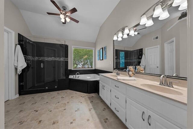 12606 Slater St, Overland Park, KS 66213 - full bath featuring vaulted ceiling, a shower stall, double vanity, a garden tub, and a ceiling fan