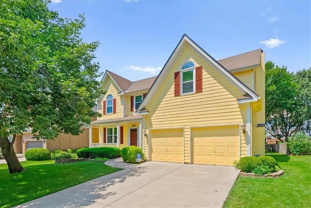 12606 Slater St, Overland Park, KS 66213 - traditional home featuring a garage, driveway, and a front lawn