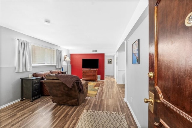 8215 Santa Fe Dr Unit 10, Overland Park, KS 66204 - living area featuring baseboards, wood finished floors, and visible vents