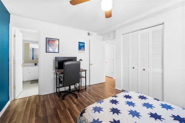 8215 Santa Fe Dr Unit 10, Overland Park, KS 66204 - bedroom featuring visible vents, a closet, ensuite bathroom, ceiling fan, and dark wood-style floors