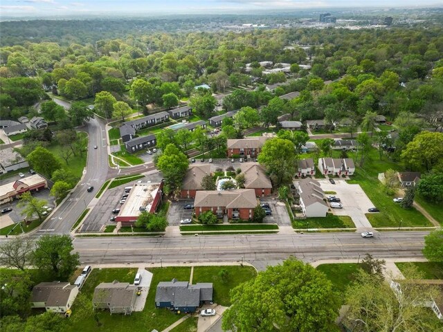 8215 Santa Fe Dr Unit 10, Overland Park, KS 66204 - drone / aerial view featuring a wooded view