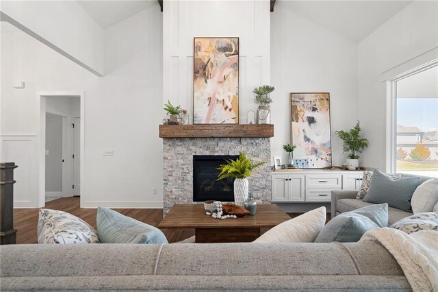 25013 W 90th Ter, Lenexa, KS 66227 - living room with high vaulted ceiling, wood finished floors, and a fireplace