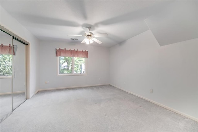 2269 SW Park Ave, Blue Springs, MO 64015 - unfurnished bedroom featuring carpet, a ceiling fan, and a closet
