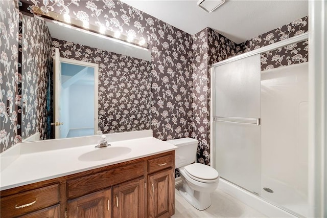 2269 SW Park Ave, Blue Springs, MO 64015 - full bathroom featuring wallpapered walls, vanity, and a shower stall