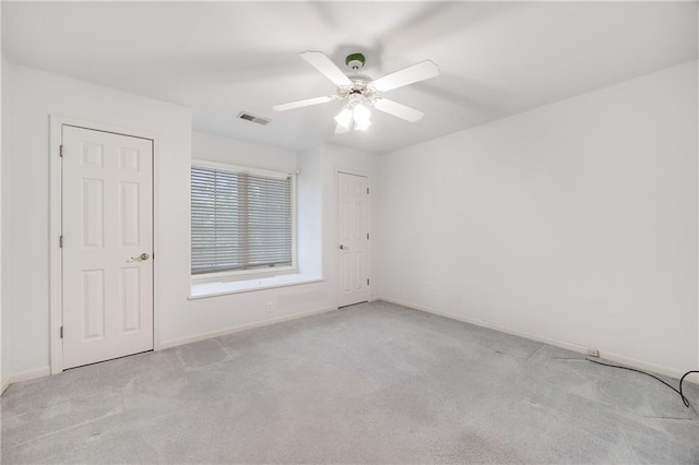 2269 SW Park Ave, Blue Springs, MO 64015 - unfurnished room with carpet floors and a ceiling fan