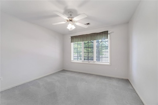 2269 SW Park Ave, Blue Springs, MO 64015 - empty room with light carpet and a ceiling fan