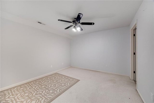 2269 SW Park Ave, Blue Springs, MO 64015 - spare room featuring light carpet and a ceiling fan