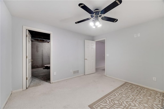 2269 SW Park Ave, Blue Springs, MO 64015 - unfurnished bedroom with carpet floors, a ceiling fan, and a spacious closet