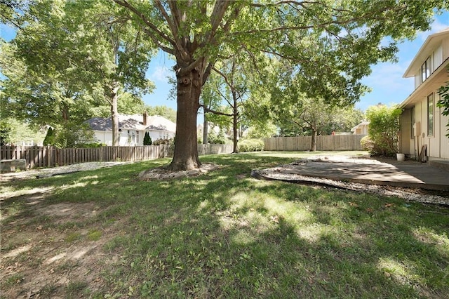 2269 SW Park Ave, Blue Springs, MO 64015 - fenced backyard with a patio
