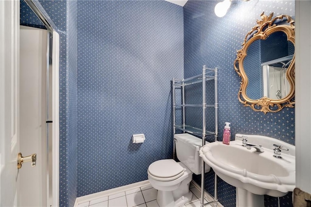 2269 SW Park Ave, Blue Springs, MO 64015 - bathroom with tile patterned floors and wallpapered walls