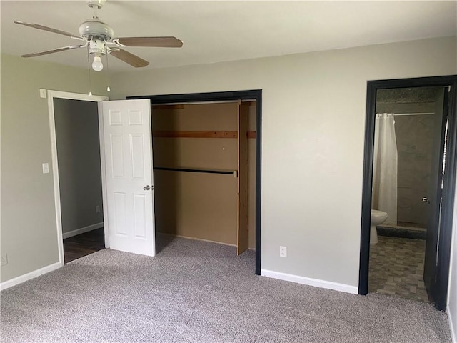 unfurnished bedroom with connected bathroom, a closet, ceiling fan, carpet, and baseboards