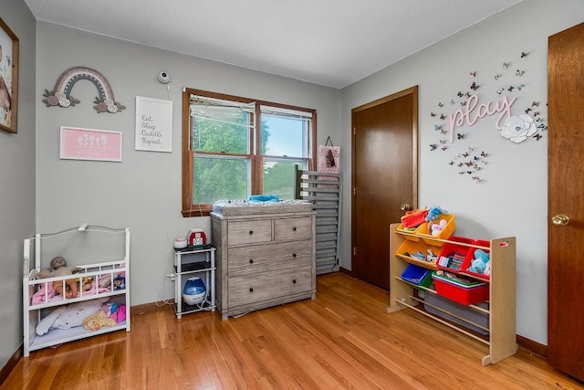 1835 Miami St, Leavenworth, KS 66048 - game room featuring wood finished floors and baseboards