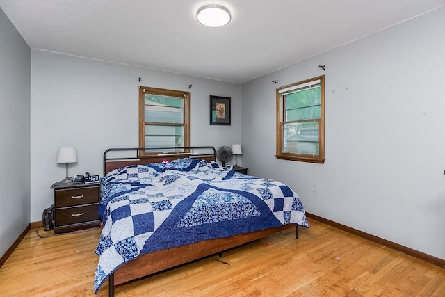 1835 Miami St, Leavenworth, KS 66048 - bedroom featuring wood finished floors and baseboards