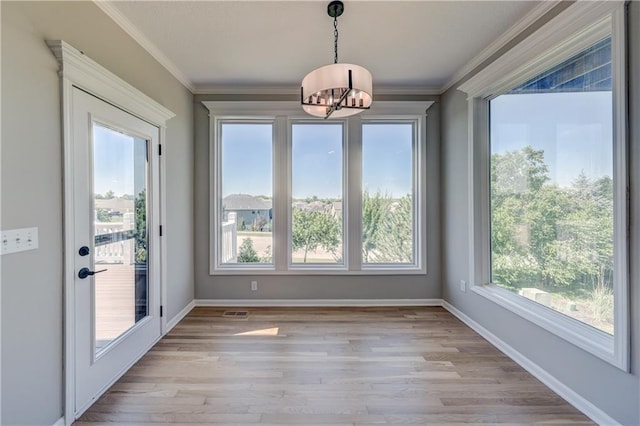 24108 W 67th Ter, Shawnee, KS 66226 - unfurnished sunroom with a chandelier