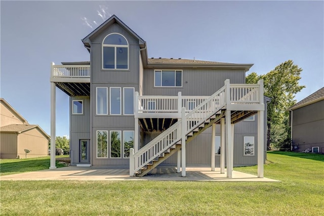 24108 W 67th Ter, Shawnee, KS 66226 - rear view of property featuring stairs, a patio area, a wooden deck, and a yard