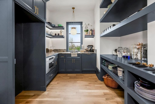 pantry with a sink