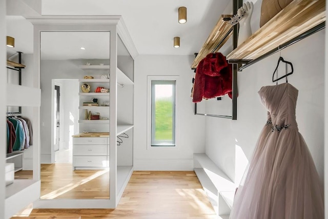 mudroom with light wood-style flooring