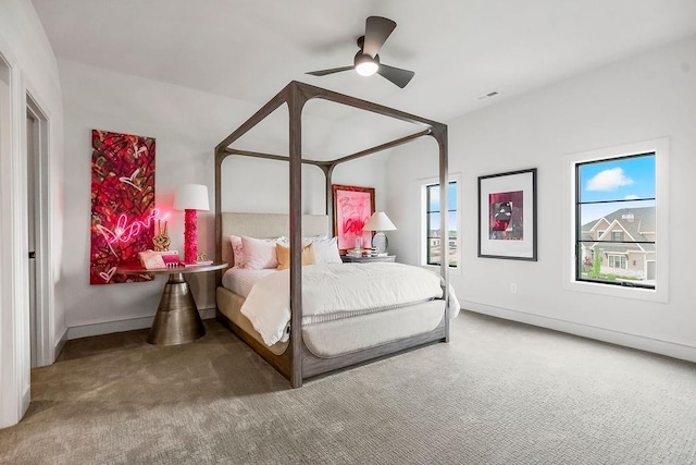 bedroom with visible vents, carpet, ceiling fan, and baseboards