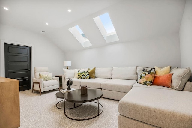 living area with recessed lighting, light carpet, and lofted ceiling with skylight